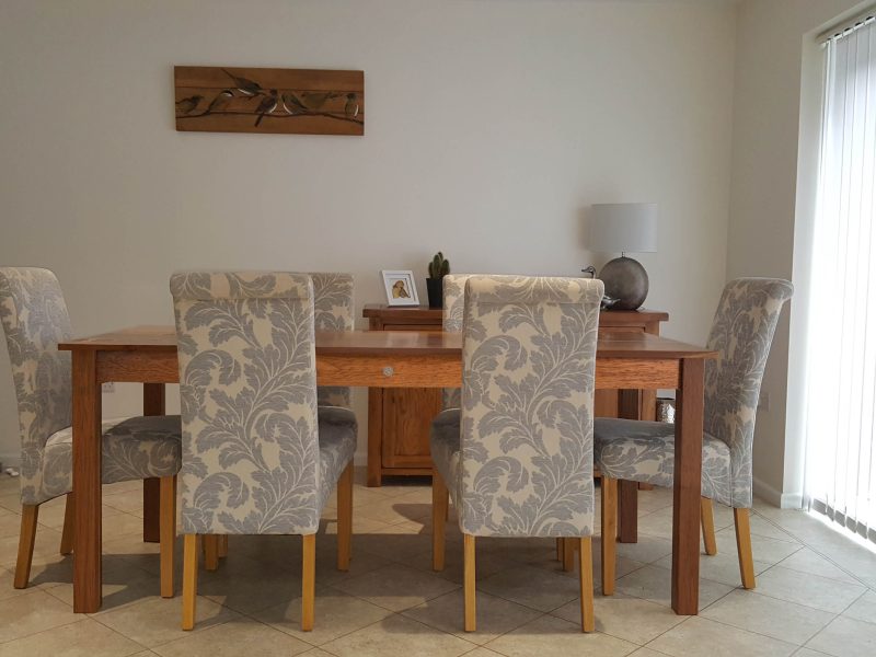 English Brown Oak dining table with chairs